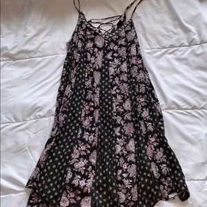 Black with colored flower patterned mini dress.